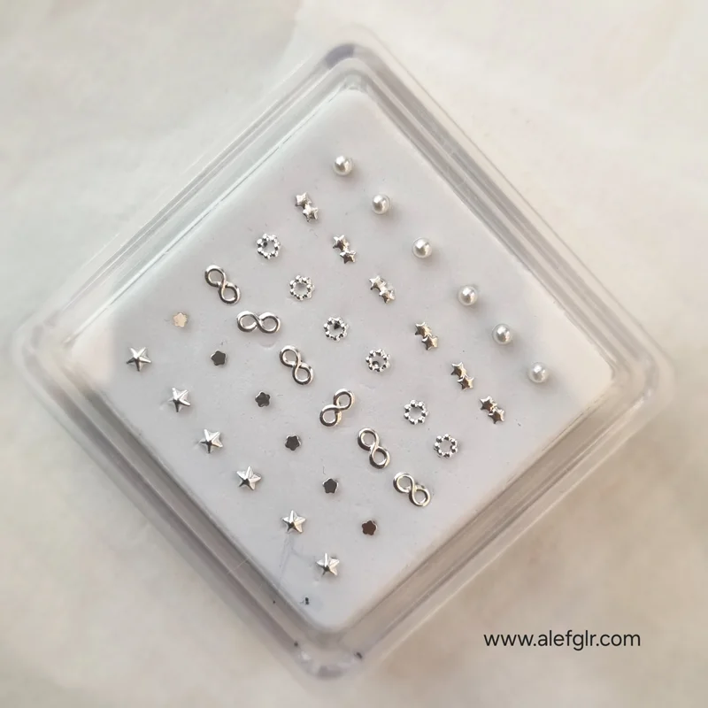 پیرسینگ بینی میخی نقره (مروارید ستاره بینهایت) کد 240648