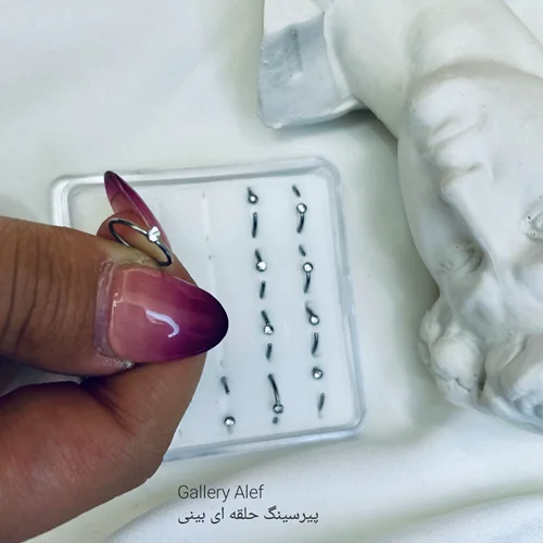 پیرسینگ بینی حلقه ای تک نگین استیل