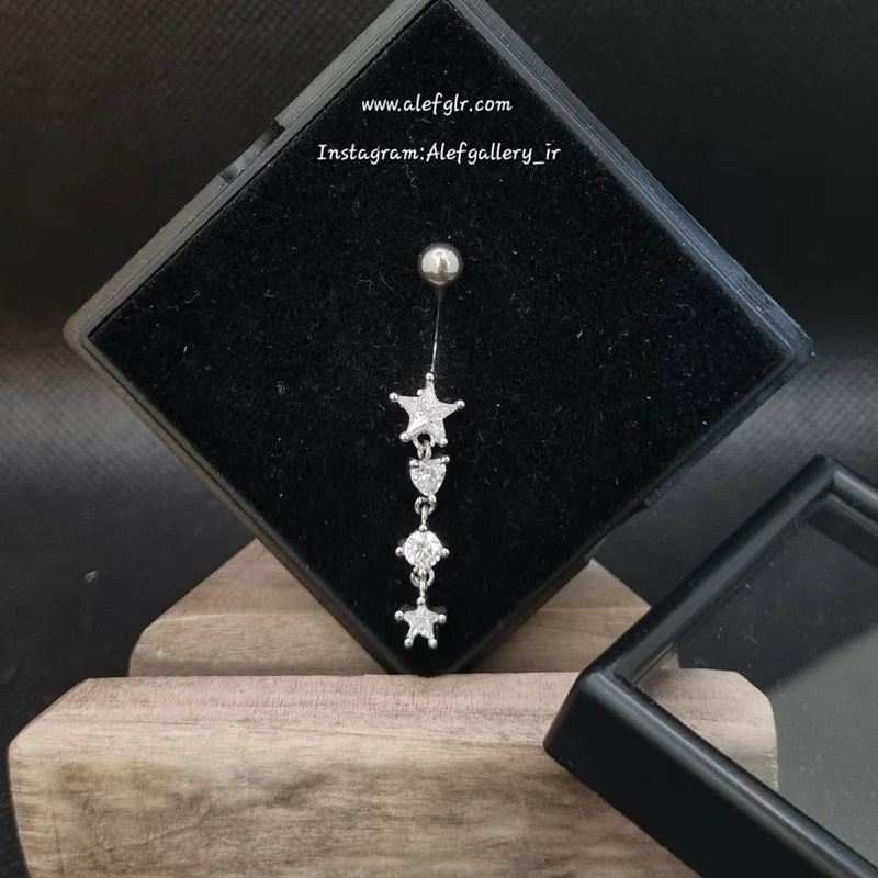 پیرسینگ ناف ستاره ای آویز دار نگین کاری شده (ارسال رایگان) کد 250193