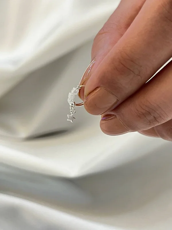 پیرسینگ بینی حلقهای مروارید همرا با آویز ستاره نقره کد 240547