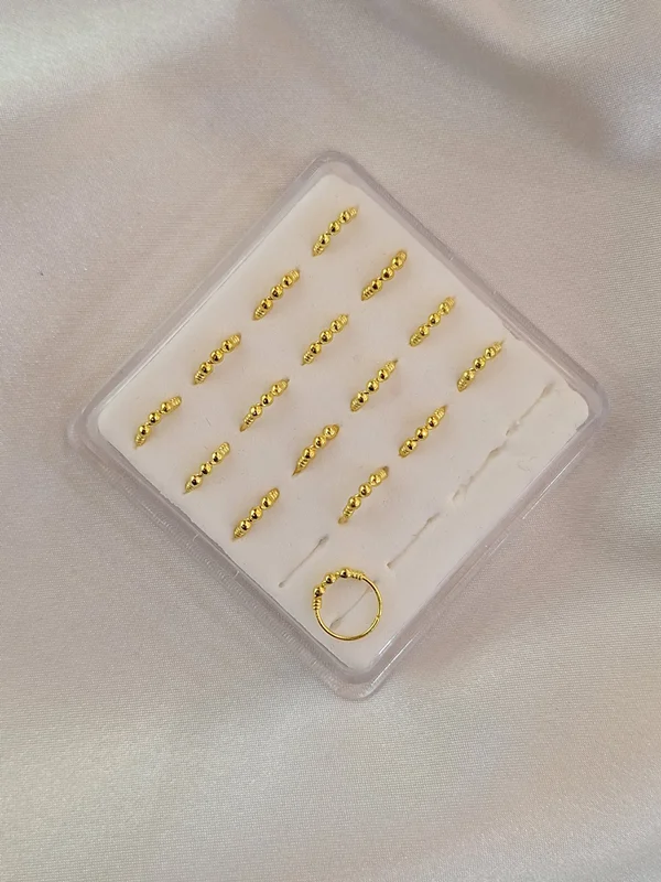 پیرسینگ بینی حلقهای سه توپی کد 240509