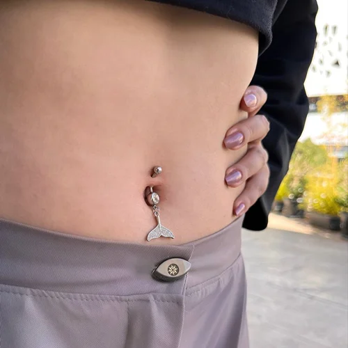 پیرسینگ ناف دم دلفین یا دم وال