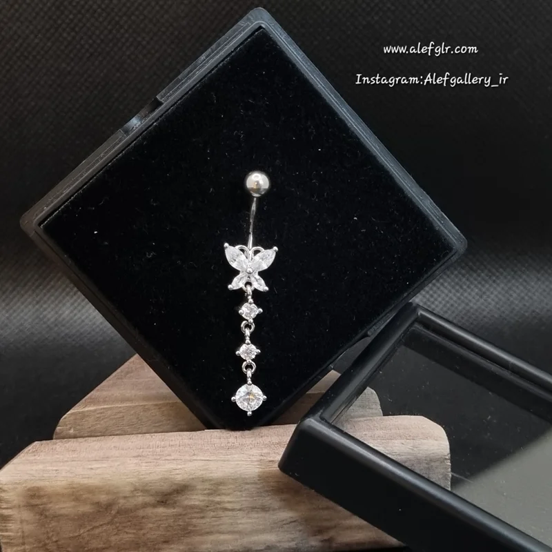 پیرسینگ ناف طرح پروانه آویز دار نگین کاری شده (ارسال رایگان) کد 25094