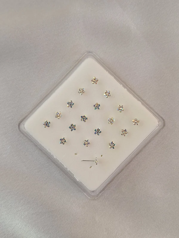 پیرسینگ بینی گل نقره 240616