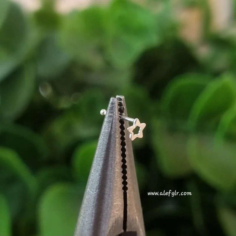 پیرسینگ بینی نقره طرح ستاره کد 240663